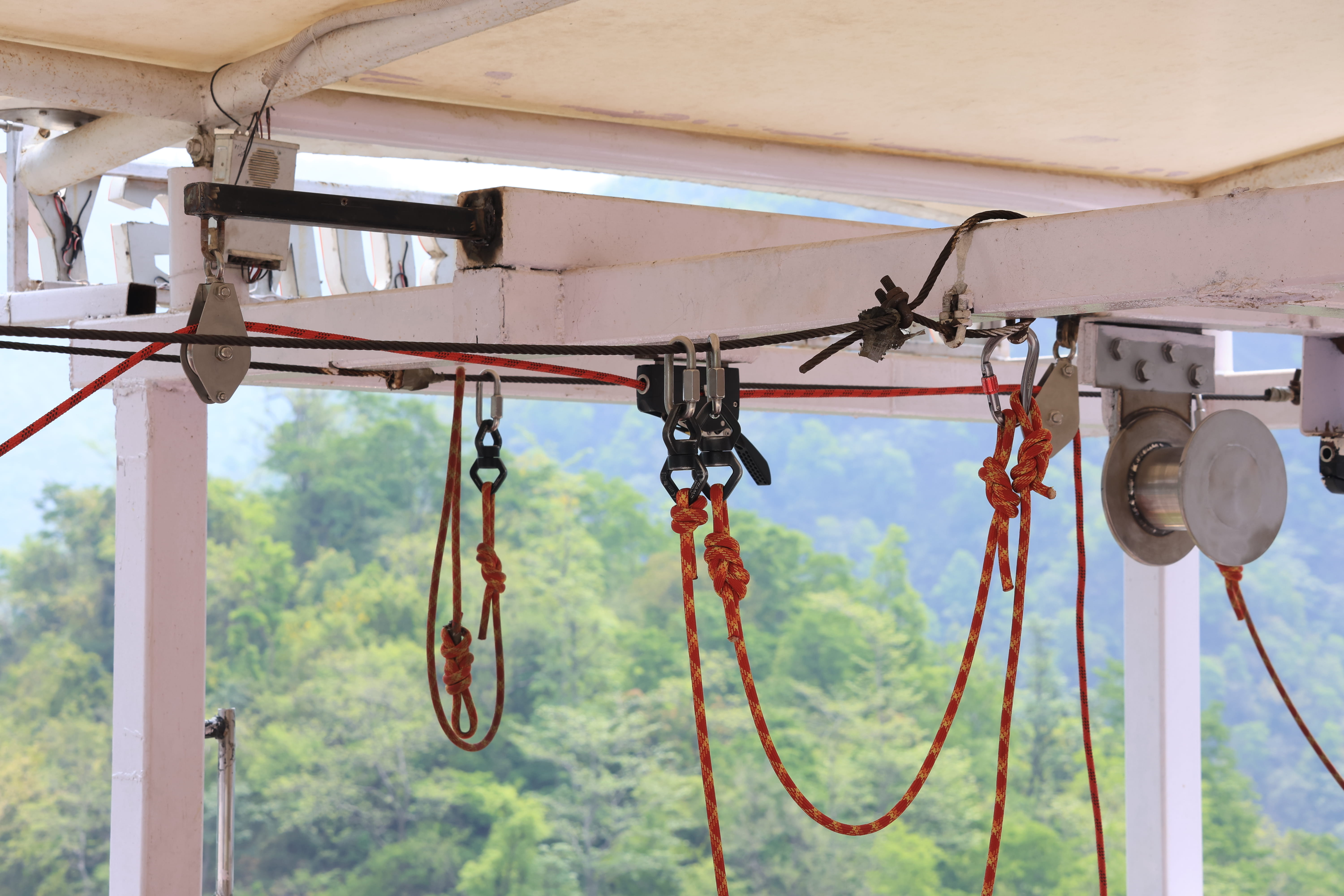 Safety team conducting pre-jump checks at Splash Bungy